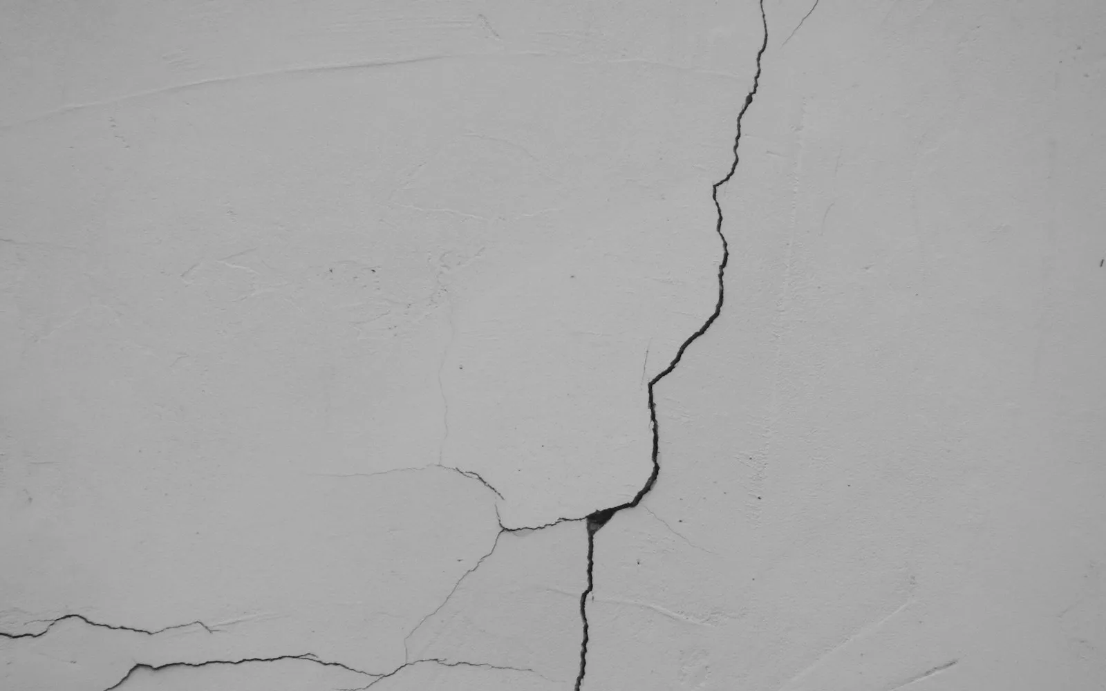 Open and clean: plaster and crack repair